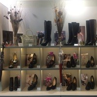 Логотип компании Бабочка, салон итальянской обуви